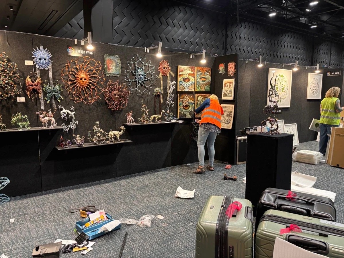 Brenda Nyhof’s stand being installed at Christchurch Art Show 2026, Te Pae